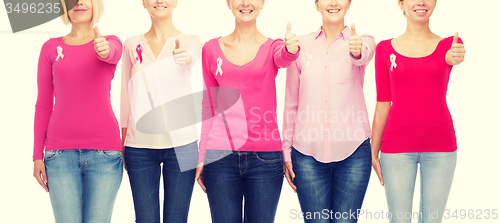 Image of close up of women with cancer awareness ribbons