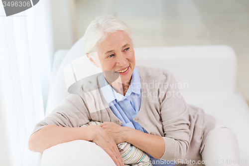 Image of happy senior woman face at home