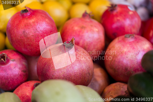 Image of close up of pomegranate at street farmers market