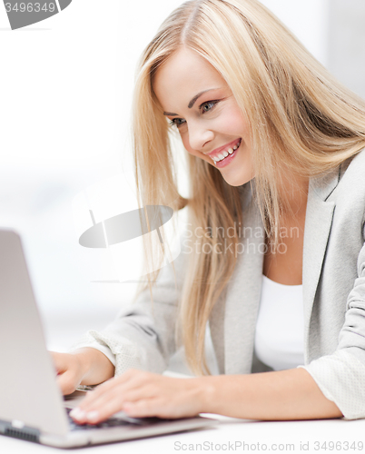Image of businesswoman with laptop