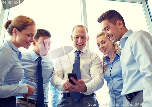 Image of happy businesspeople with smartphone