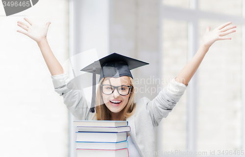 Image of happy student in graduation cap