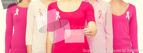 Image of close up of women with cancer awareness ribbons