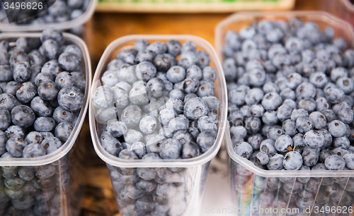 Image of close up of blueberries in boxes at street market