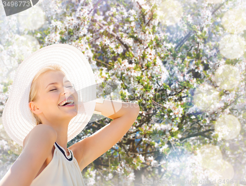 Image of beautiful woman enjoying summer outdoors