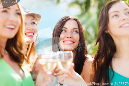 Image of girls with champagne glasses