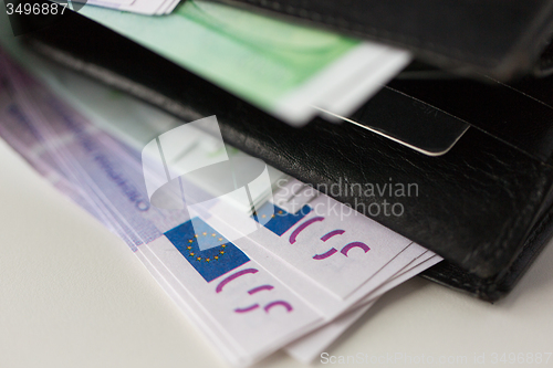 Image of close up of euro paper money in wallet