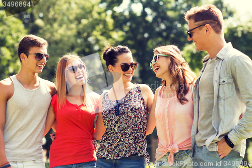 Image of group of smiling friends outdoors