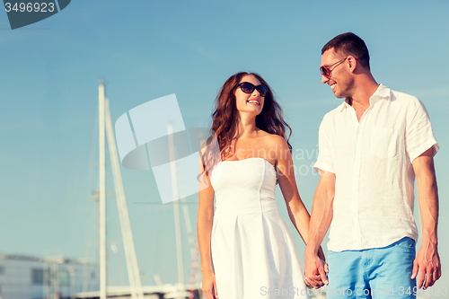 Image of smiling couple in city