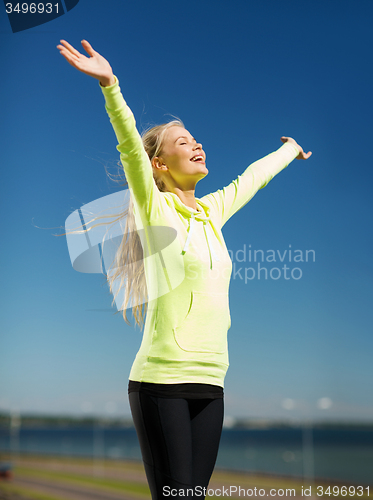 Image of woman doing sports outdoors