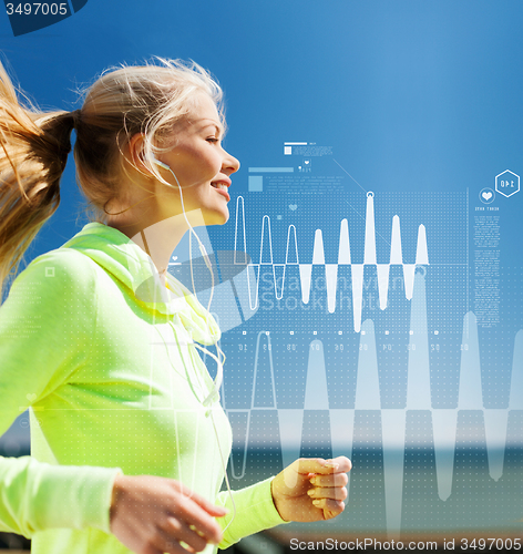 Image of smiling woman doing running outdoors