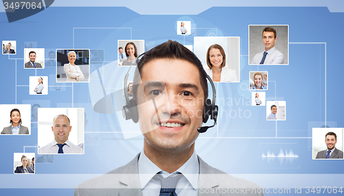 Image of businessman in headset over contacts icons