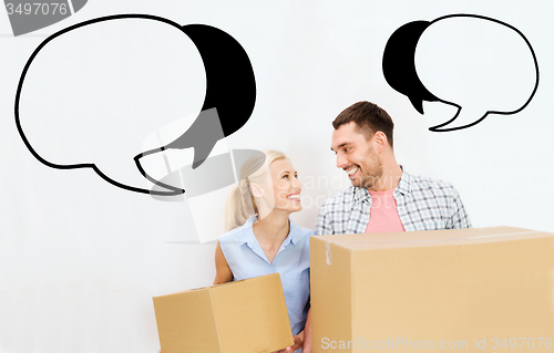 Image of couple with delivery boxes moving to new home