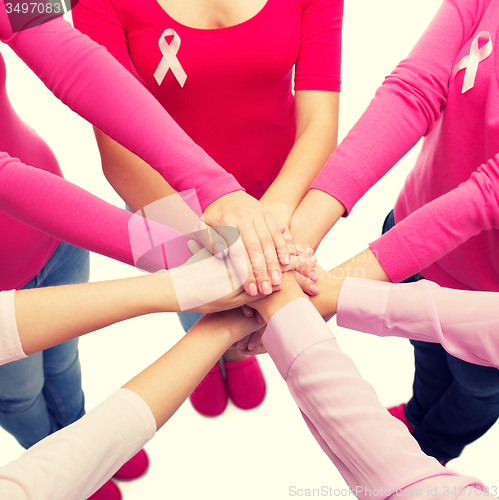 Image of close up of women with cancer awareness ribbons