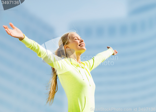 Image of woman doing sports outdoors