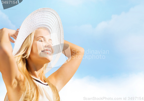 Image of beautiful woman enjoying summer outdoors