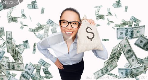 Image of smiling businesswoman with dollar cash money