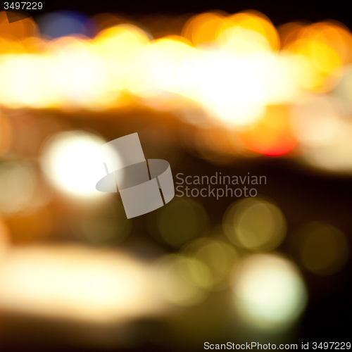 Image of golden bright lights on dark night background