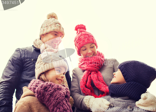 Image of happy family outdoors