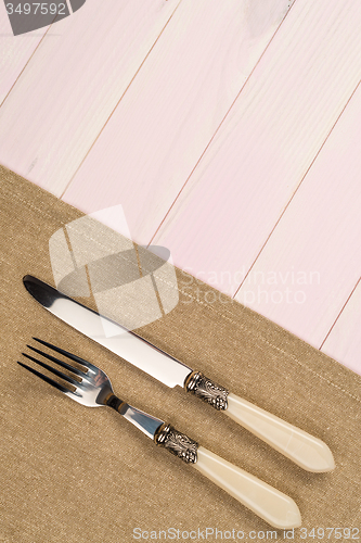 Image of Kitchenware on beige towel