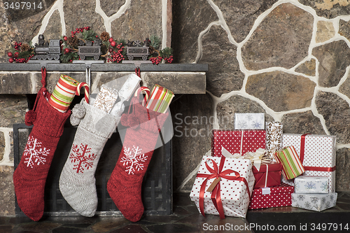 Image of Christmas stockings\r and presents