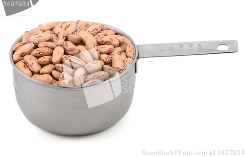 Image of Borlotti beans in a measuring cup