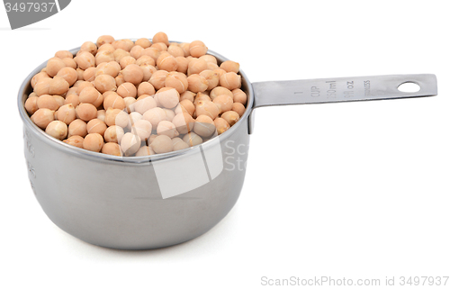 Image of Dried chick peas in a measuring cup