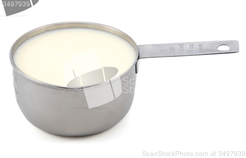 Image of Milk in a measuring cup