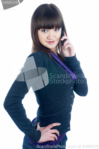 Image of Beautiful brunette girl talking on phone