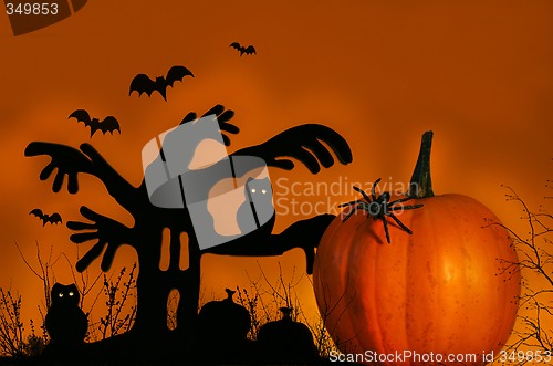 Image of Spooky tree with pumpkin