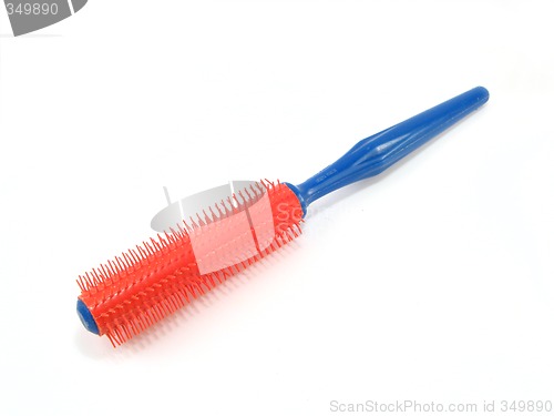 Image of red and blue hairbrush