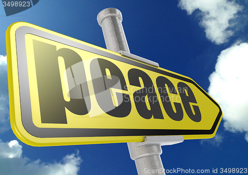 Image of Yellow road sign with peace word under blue sky