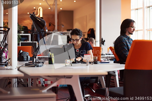 Image of startup business, woman  working on laptop