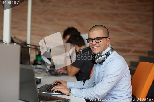 Image of startup business, software developer working on computer