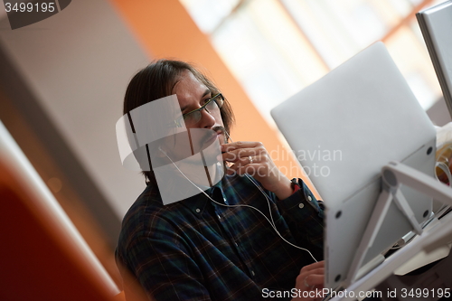 Image of startup business, software developer working on computer