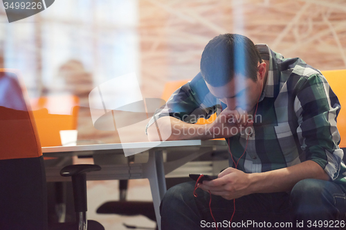 Image of startup business, software developer working on computer