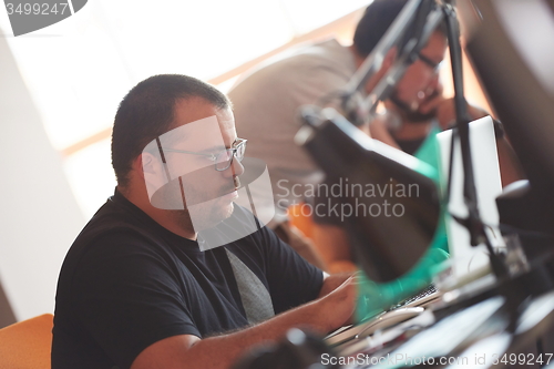 Image of startup business, software developer working on computer