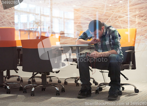 Image of startup business, software developer working on computer