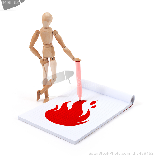 Image of Wooden mannequin writing - Fire