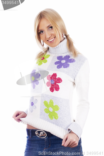 Image of Pretty woman in sweater smiling
