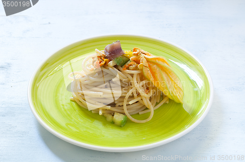 Image of Spaghetti with marinated anchovy, zucchini and zucchini flowers