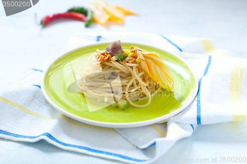 Image of Spaghetti with marinated anchovy, zucchini and zucchini flowers
