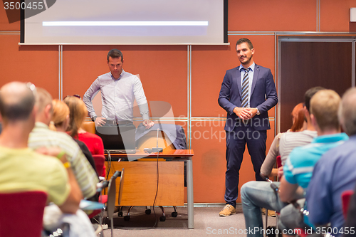 Image of Speaker Giving a Talk at Business Meeting.