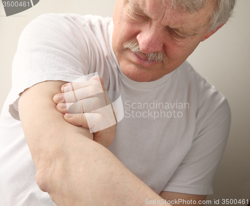 Image of senior man with arm pain	