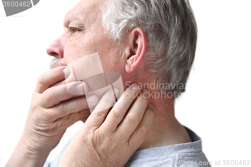 Image of senior with neck and jaw stiffness