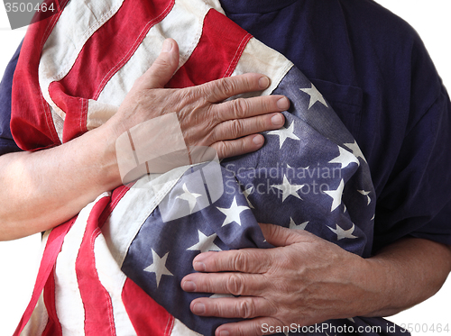 Image of USA flag held by a veteran