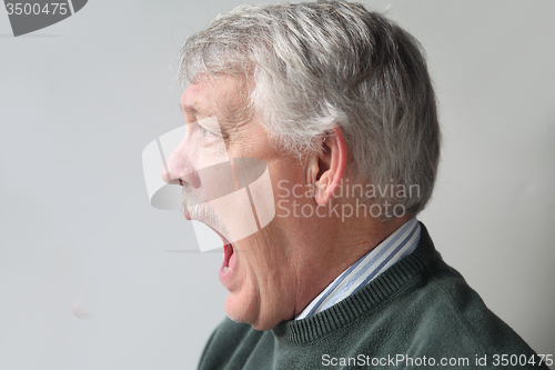 Image of terrified older man