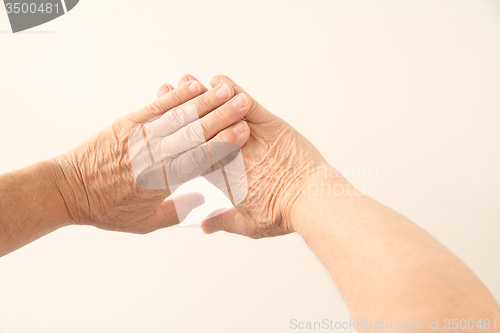 Image of hands of 70-year old man	