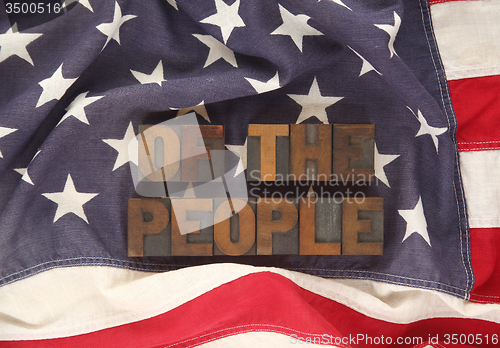 Image of USA flag with of the people words