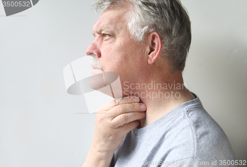 Image of man with throat pain